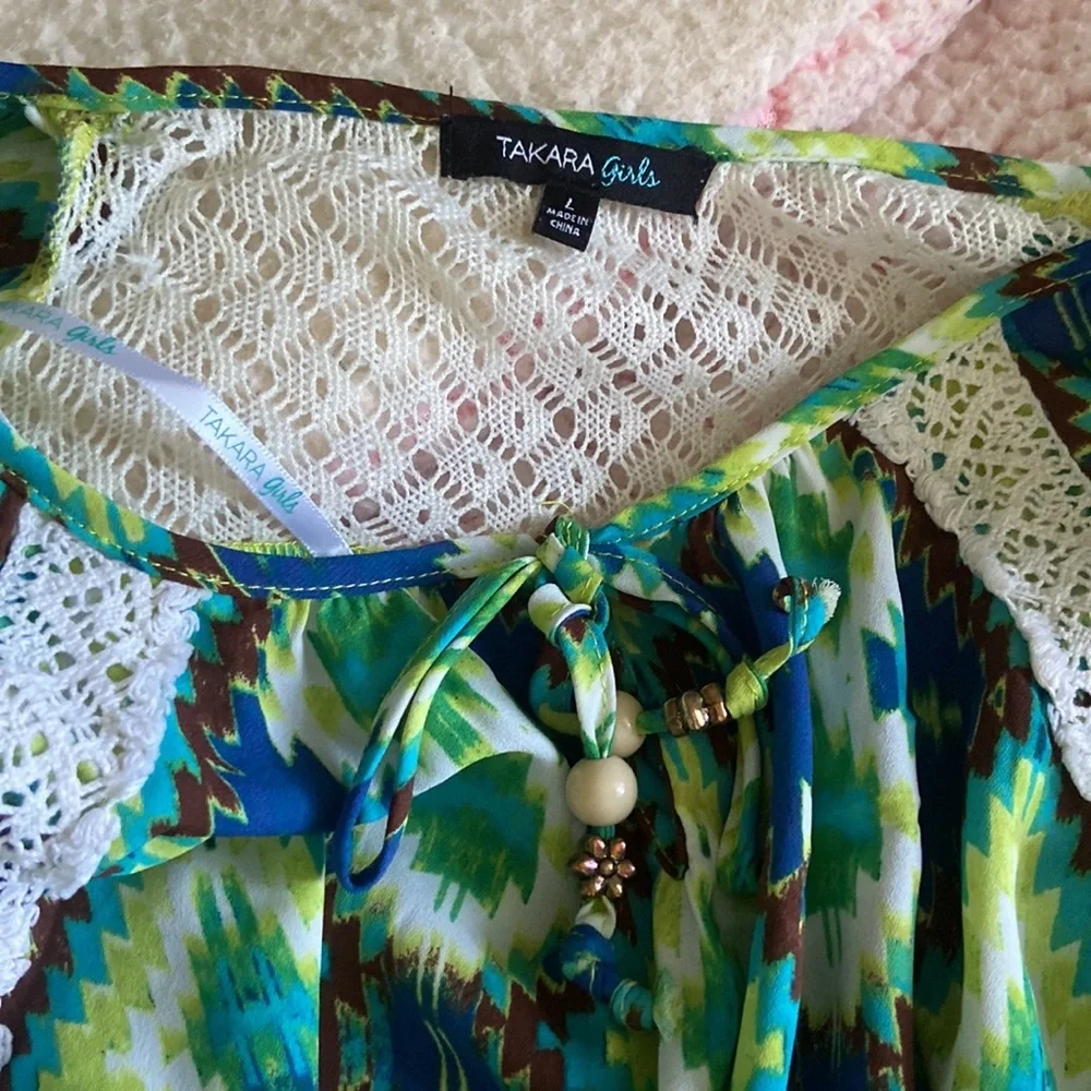 Girls blouse with a super cute design..